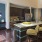 a kitchen with a dining table and chairs