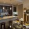 a kitchen with a bar and stools