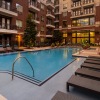 Sparkling blue pool with a large pool deck 