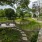 a park with a fence and trees