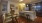 a kitchen with a table and chairs