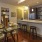 a kitchen with a table and chairs